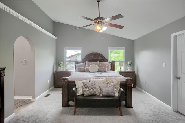 8014 Maureen Dr, Cranberry Twp, PA 16066 - bedroom featuring arched walkways, light colored carpet, lofted ceiling, baseboards, and ceiling fan