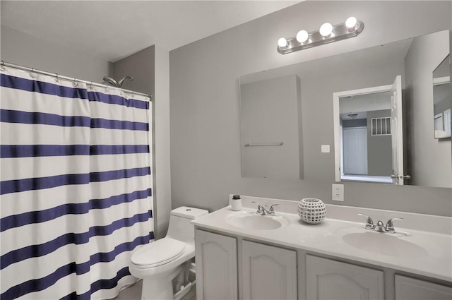 8014 Maureen Dr, Cranberry Twp, PA 16066 - bathroom with toilet, double vanity, and a shower with curtain