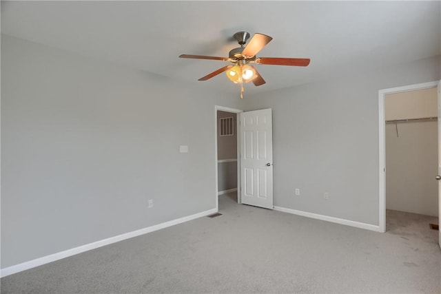 8014 Maureen Dr, Cranberry Twp, PA 16066 - unfurnished bedroom featuring light carpet, a spacious closet, a closet, and ceiling fan