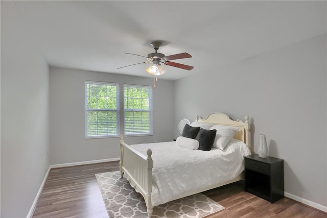 8014 Maureen Dr, Cranberry Twp, PA 16066 - bedroom featuring baseboards, wood finished floors, and a ceiling fan
