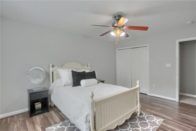 8014 Maureen Dr, Cranberry Twp, PA 16066 - bedroom with baseboards, wood finished floors, and a closet