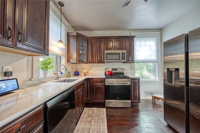 31 Nicholson St, Crafton, PA 15205 - kitchen featuring stainless steel appliances, a sink, dark wood-style flooring, glass insert cabinets, and dark brown cabinetry