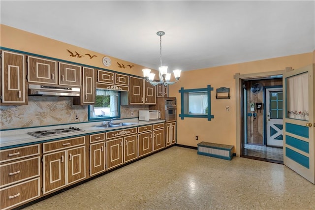 427 Harpers Ferry Rd, North Sewickley Twp, PA 15010 - kitchen with under cabinet range hood, white microwave, oven, a sink, and electric cooktop