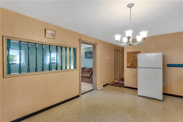 427 Harpers Ferry Rd, North Sewickley Twp, PA 15010 - kitchen featuring freestanding refrigerator, baseboards, tile patterned floors, and a chandelier