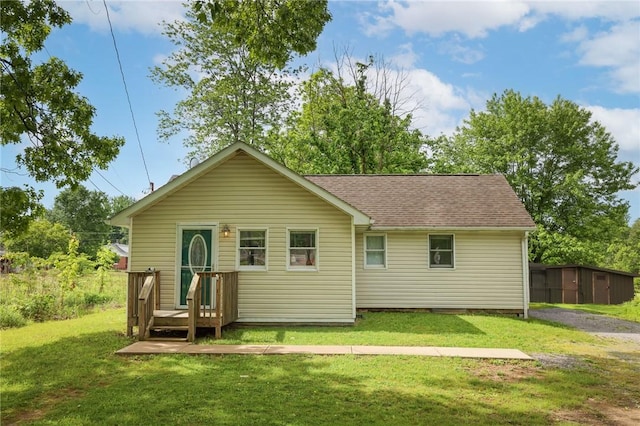 343 Whitestown Rd, Twp Of But Nw, PA 16001 - back of house with a lawn and a shingled roof