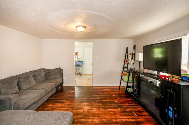 343 Whitestown Rd, Twp Of But Nw, PA 16001 - living room with wood finished floors, a textured ceiling, and baseboards