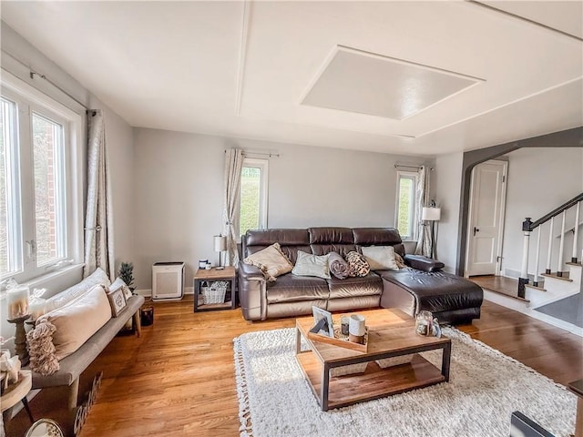 4330 Overhill St, Bethel Park, PA 15102 - living room featuring light wood finished floors and stairs
