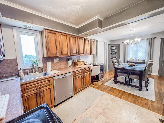 4330 Overhill St, Bethel Park, PA 15102 - kitchen featuring dishwasher, brown cabinetry, a sink, light countertops, and crown molding