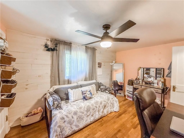 4330 Overhill St, Bethel Park, PA 15102 - bedroom featuring wood finished floors, wood walls, and ceiling fan