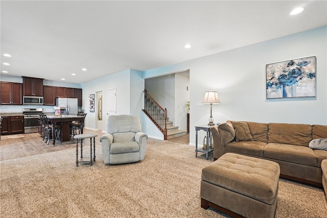 407 Isabella Ct, Zelienople Boro, PA 16063 - living room with stairs, recessed lighting, baseboards, and light wood-style floors