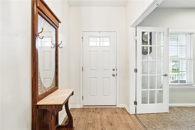 407 Isabella Ct, Zelienople Boro, PA 16063 - entryway with baseboards and light wood finished floors