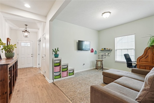 407 Isabella Ct, Zelienople Boro, PA 16063 - living area with baseboards and light wood finished floors