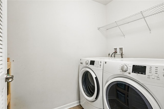 407 Isabella Ct, Zelienople Boro, PA 16063 - washroom with washing machine and dryer and baseboards