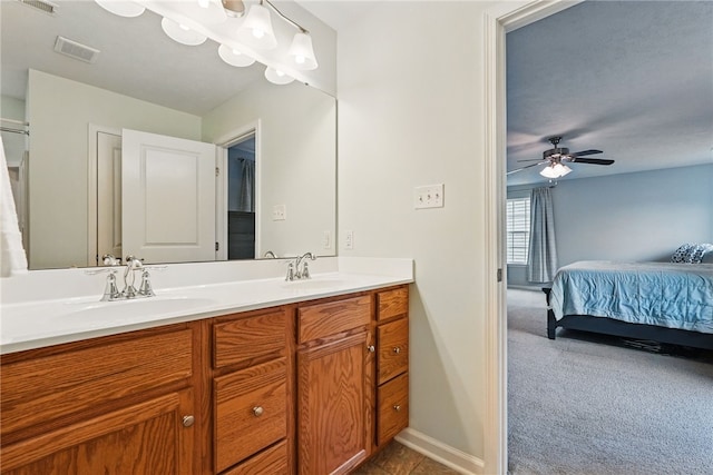407 Isabella Ct, Zelienople Boro, PA 16063 - full bathroom featuring ensuite bathroom, double vanity, baseboards, and a ceiling fan