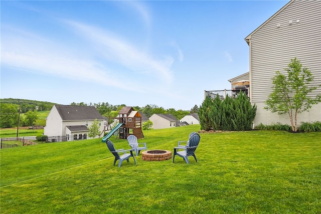 407 Isabella Ct, Zelienople Boro, PA 16063 - view of yard featuring a fire pit and a playground