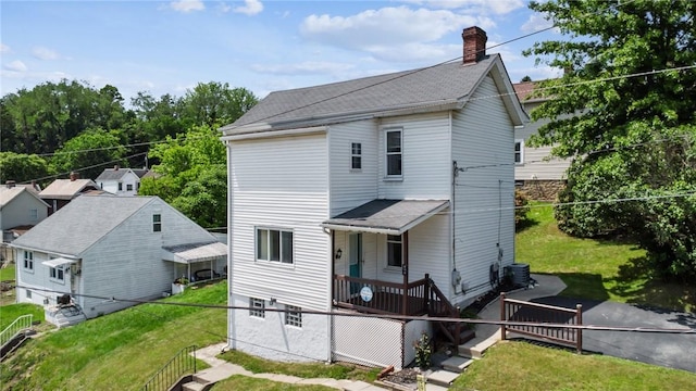 600 Scott St, Penn Twp Wml, PA 15675 - back of property with a chimney and a shingled roof