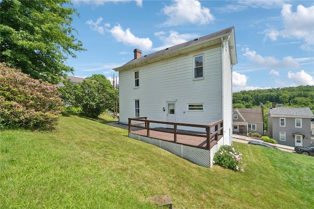 600 Scott St, Penn Twp Wml, PA 15675 - back of house featuring a yard, a deck, and a chimney