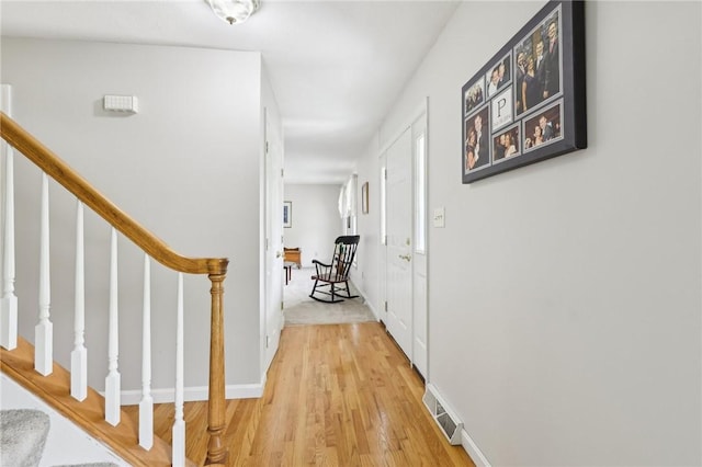 1025 Manor Vue Ct, Murrysville, PA 15626 - hall featuring light wood finished floors and stairs