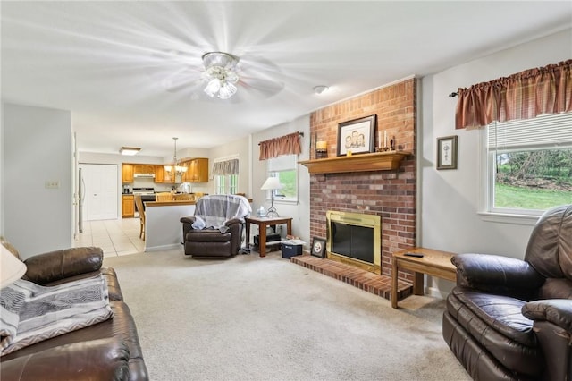 1025 Manor Vue Ct, Murrysville, PA 15626 - living room with a brick fireplace, light colored carpet, and a chandelier