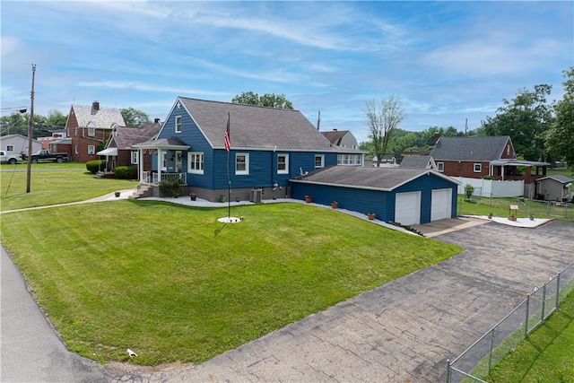 5 Beach St, Centerville, PA 15358 - view of front of property featuring an outdoor structure, a garage, and a residential view