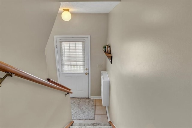 309 Wildflower Ct, Ross Twp, PA 15202 - stairs with tile patterned floors and baseboards