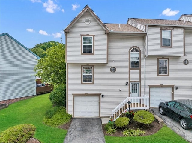309 Wildflower Ct, Ross Twp, PA 15202 - view of front of property featuring an attached garage, a front yard, and asphalt driveway
