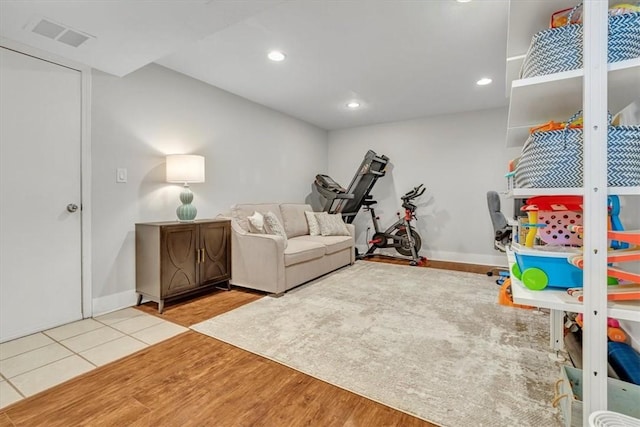309 Wildflower Ct, Ross Twp, PA 15202 - workout room with wood finished floors, baseboards, and recessed lighting