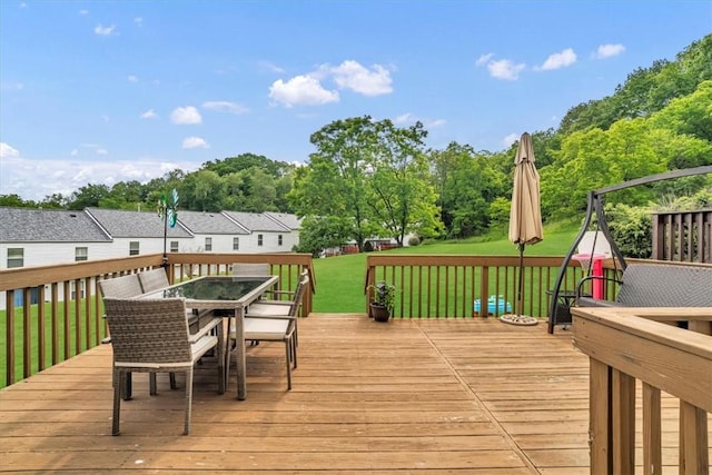 309 Wildflower Ct, Ross Twp, PA 15202 - deck featuring outdoor dining space, a lawn, and view of wooded area