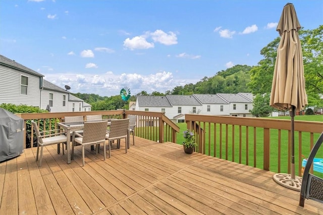 309 Wildflower Ct, Ross Twp, PA 15202 - deck with outdoor dining space, a yard, a residential view, and a grill