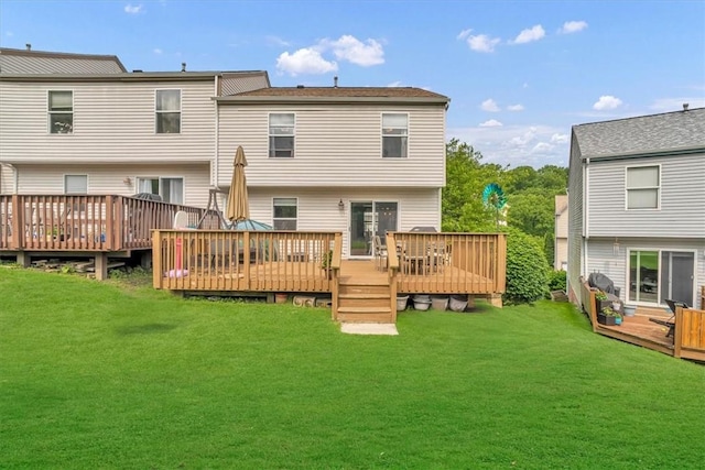 309 Wildflower Ct, Ross Twp, PA 15202 - rear view of house with a yard and a deck