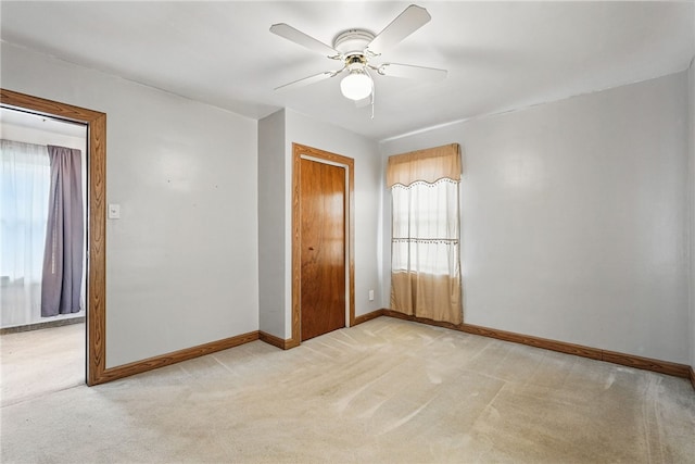 1122 Tyndall St, Sheraden, PA 15204 - unfurnished room with light carpet, baseboards, and a ceiling fan