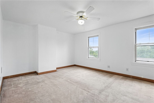 1122 Tyndall St, Sheraden, PA 15204 - spare room featuring carpet flooring, baseboards, and a ceiling fan