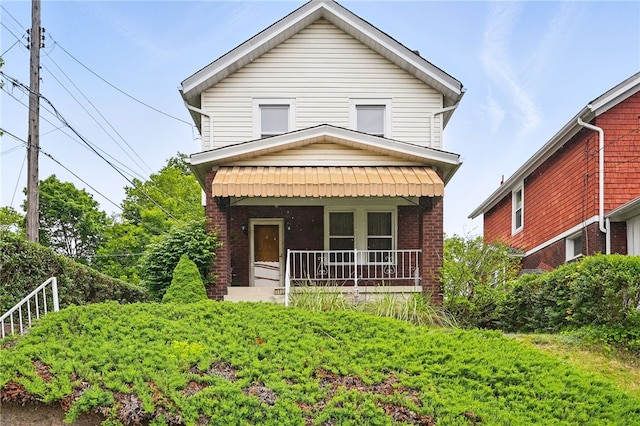 1122 Tyndall St, Sheraden, PA 15204 - view of front of property with a porch and brick siding