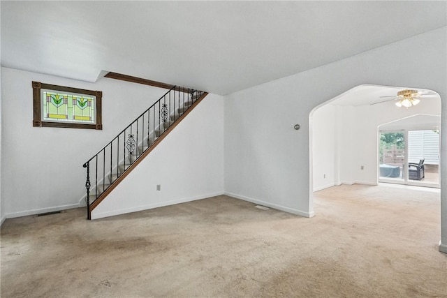 1122 Tyndall St, Sheraden, PA 15204 - unfurnished living room with carpet flooring, ceiling fan, and healthy amount of natural light