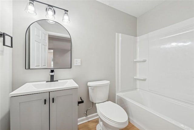 137 Limerick Rd, Sewickley Twp, PA 15637 - full bathroom featuring vanity, toilet, shower / bath combination, wood finished floors, and baseboards