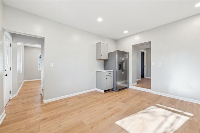 137 Limerick Rd, Sewickley Twp, PA 15637 - kitchen with stainless steel refrigerator with ice dispenser, gray cabinets, recessed lighting, light wood-style floors, and baseboards