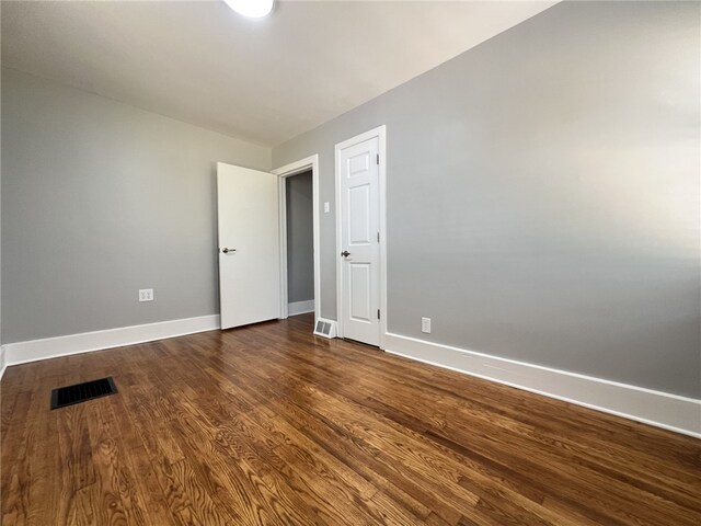 500 Main St, North Union Twp, PA 15456 - empty room with baseboards and dark wood-style flooring
