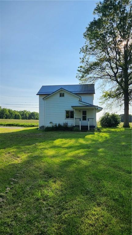 1737 Perry Hwy, Volant, PA 16156 - rear view of property with a yard