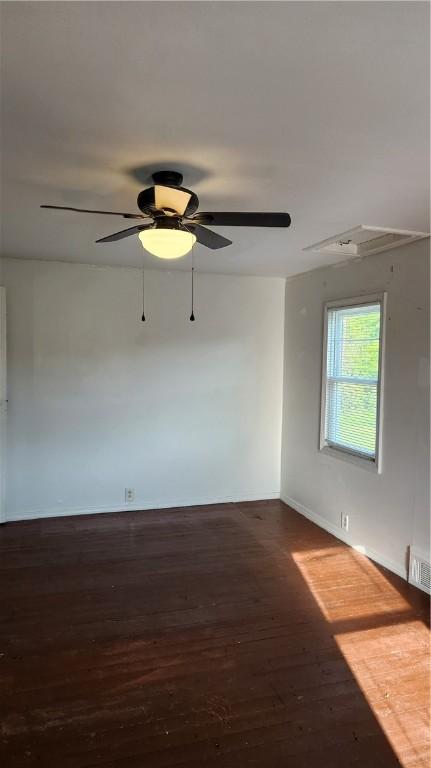 1737 Perry Hwy, Volant, PA 16156 - spare room with dark wood-type flooring, baseboards, and a ceiling fan