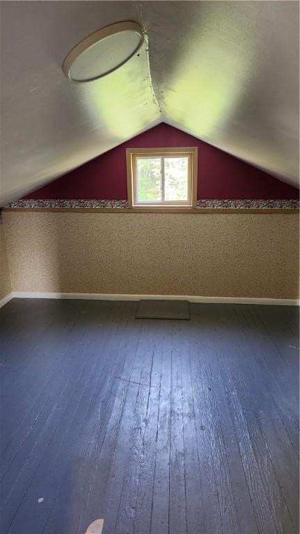 1737 Perry Hwy, Volant, PA 16156 - additional living space featuring wood-type flooring, baseboards, and lofted ceiling