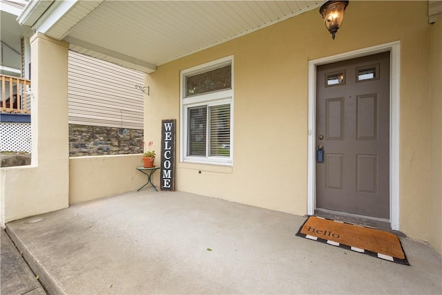 1313 Virginia Ave, Mt Washington, PA 15211 - doorway to property featuring stucco siding and a patio