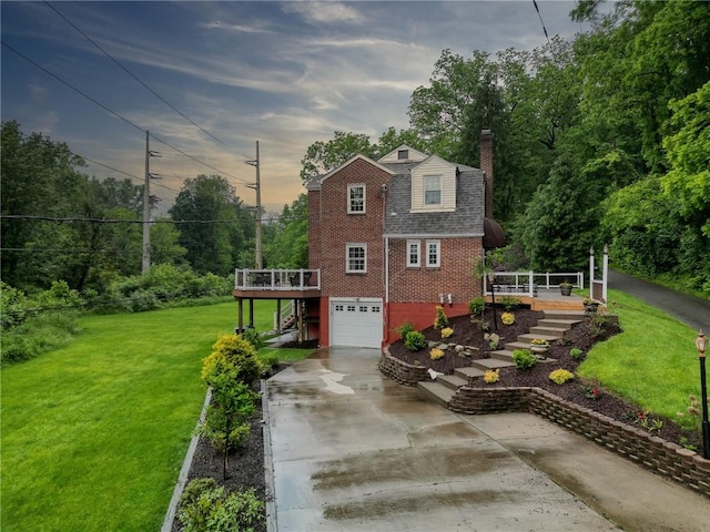 3333 Walther Ln, Upper St Clair, PA 15241 - view of property exterior featuring stairway, concrete driveway, brick siding, an attached garage, and a wooden deck