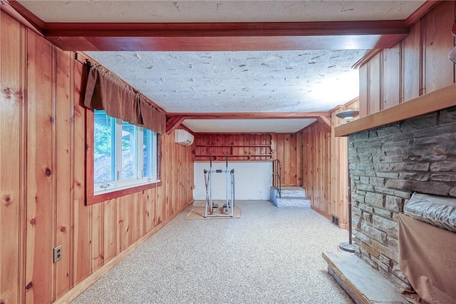 3333 Walther Ln, Upper St Clair, PA 15241 - below grade area with a wall mounted AC, wooden walls, baseboards, and light colored carpet