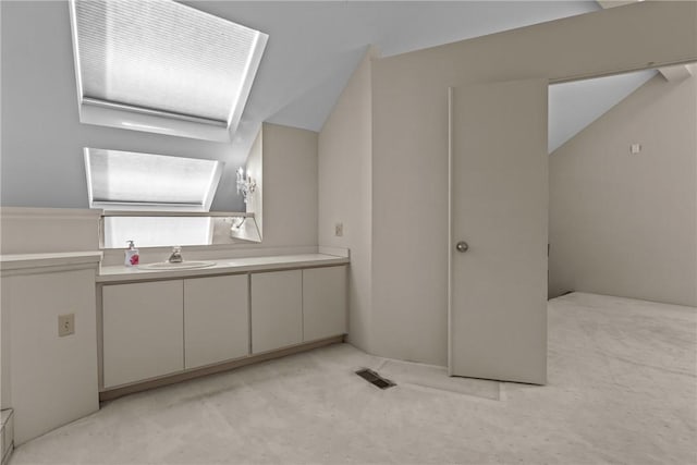 2811 Leona Ln, Robinson Twp Nwa, PA 15108 - bathroom featuring lofted ceiling and vanity
