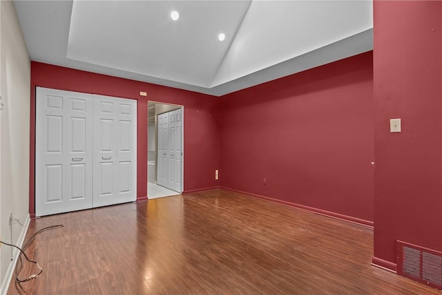 2811 Leona Ln, Robinson Twp Nwa, PA 15108 - unfurnished bedroom with wood finished floors, lofted ceiling, baseboards, and recessed lighting