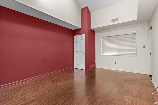 2811 Leona Ln, Robinson Twp Nwa, PA 15108 - empty room featuring high vaulted ceiling, wood finished floors, and baseboards
