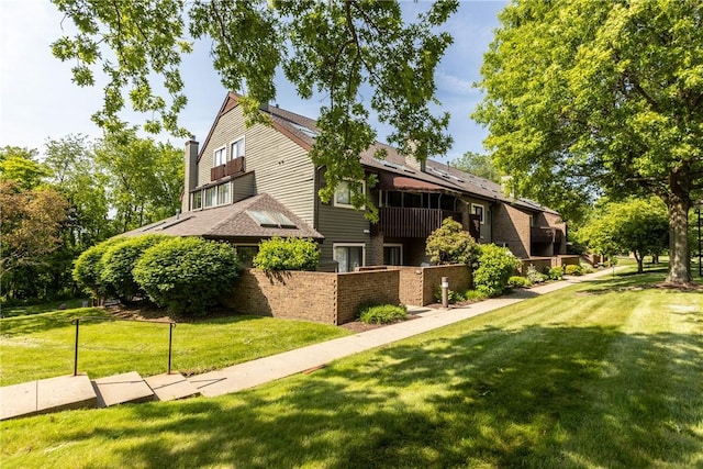 2811 Leona Ln, Robinson Twp Nwa, PA 15108 - view of property exterior featuring a chimney and a lawn