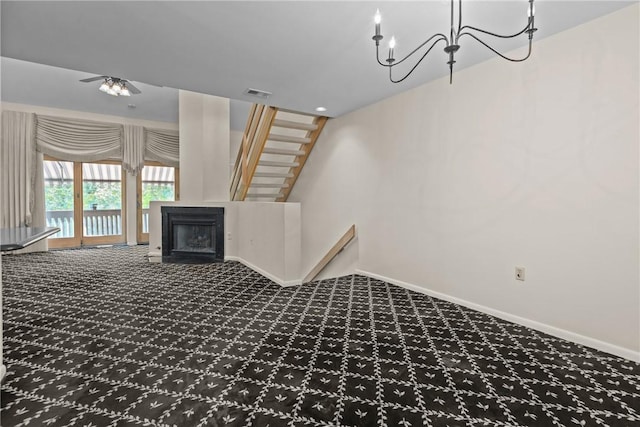 2811 Leona Ln, Robinson Twp Nwa, PA 15108 - unfurnished living room featuring carpet floors, baseboards, a fireplace, and a chandelier