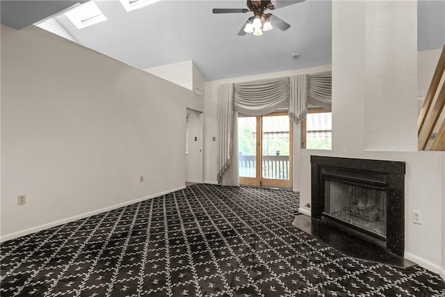 2811 Leona Ln, Robinson Twp Nwa, PA 15108 - unfurnished living room with ceiling fan, a skylight, carpet flooring, a fireplace, and vaulted ceiling