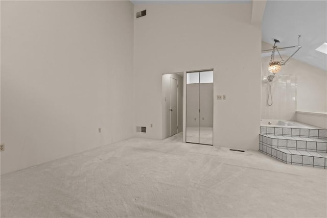 2811 Leona Ln, Robinson Twp Nwa, PA 15108 - carpeted empty room featuring high vaulted ceiling